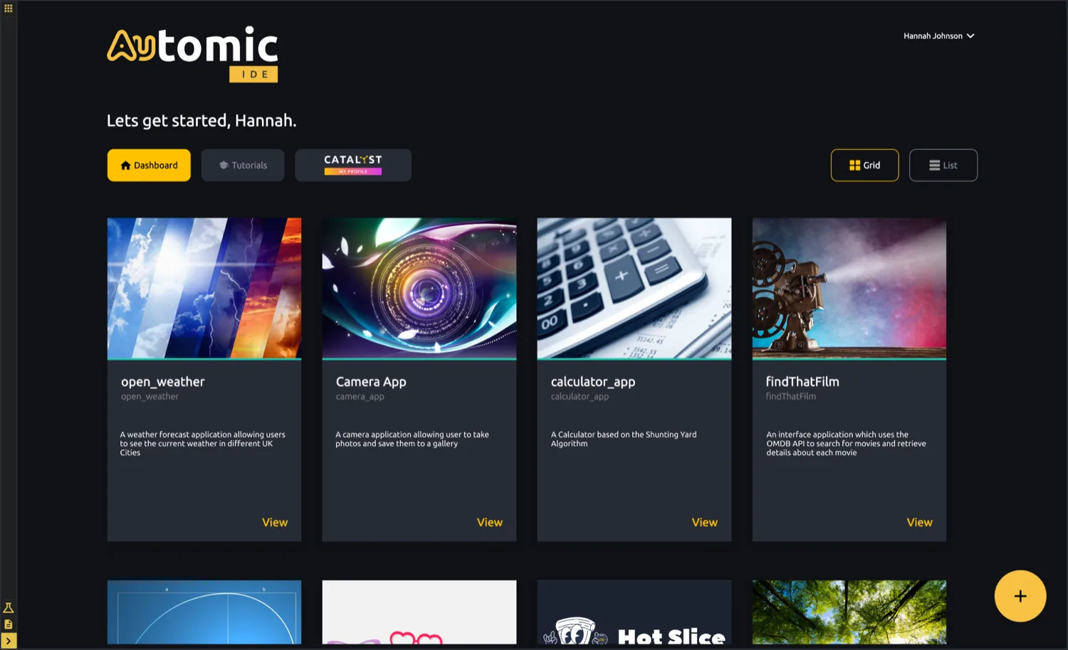 The Automic IDE dashboard: a dark screen with a gold Automic IDE logo, a greeting, and a grid of project cards, each with a cover image and description.